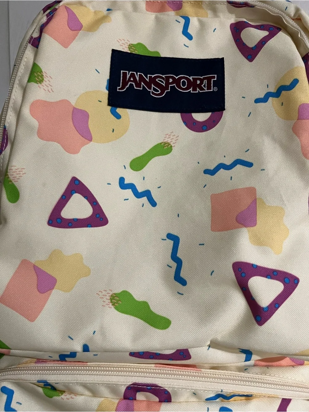 Jansport Cream Backpack with Multicolor Geometric Print